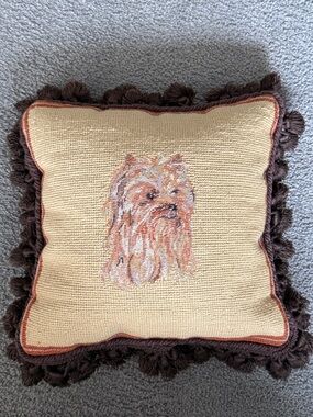 Dog Throw Pillow. Needlepoint Dog on shades of Tan, Brown & Orange. W/Pom Poms